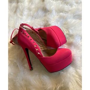 Coral pink platform heels with ankle strap size 7.